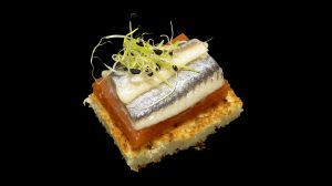 Anchovy with tomato jelly and onion shoots